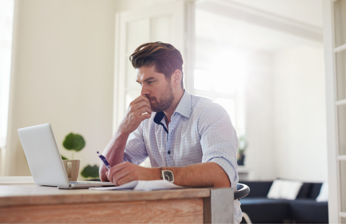 Man arranging a direct cremation at his desk